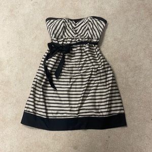 Motherhood Maternity, black and gold striped, strapless dress, size small.